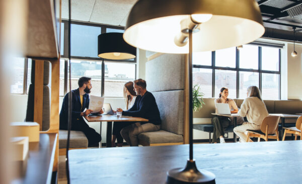 Businesspeople working in a modern co-working space coworking