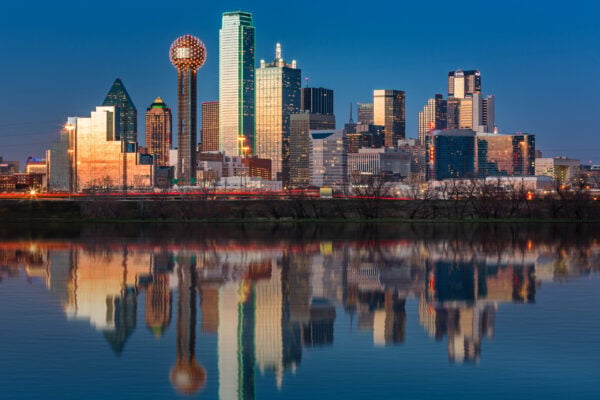 Dallas skyline reflected in Trinity River at sunset dallas